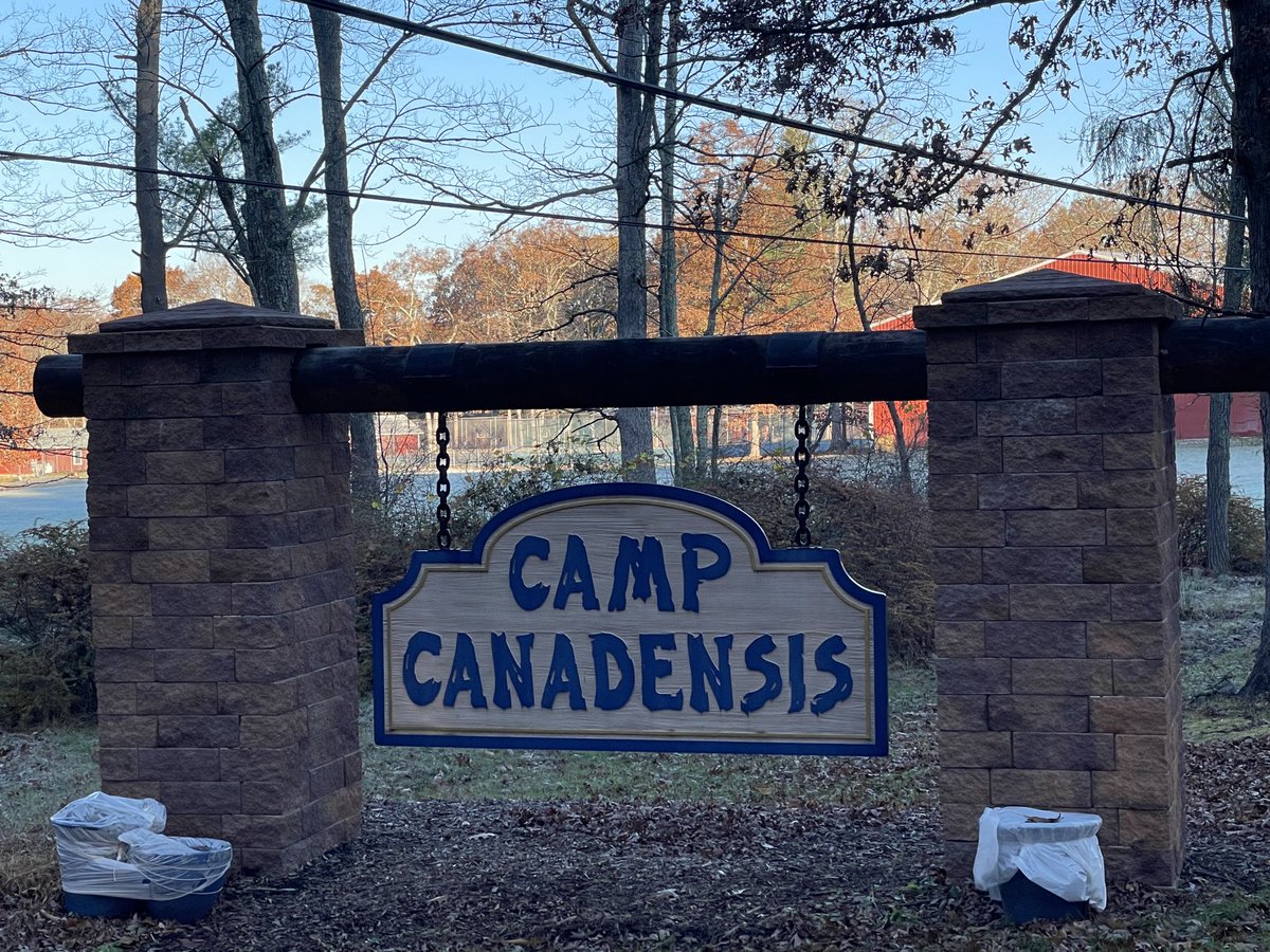 Canadensis's tweet photo. The camp sign with a frosted Pavilion Field in the background. https://t.co/CXhcrUXSoz