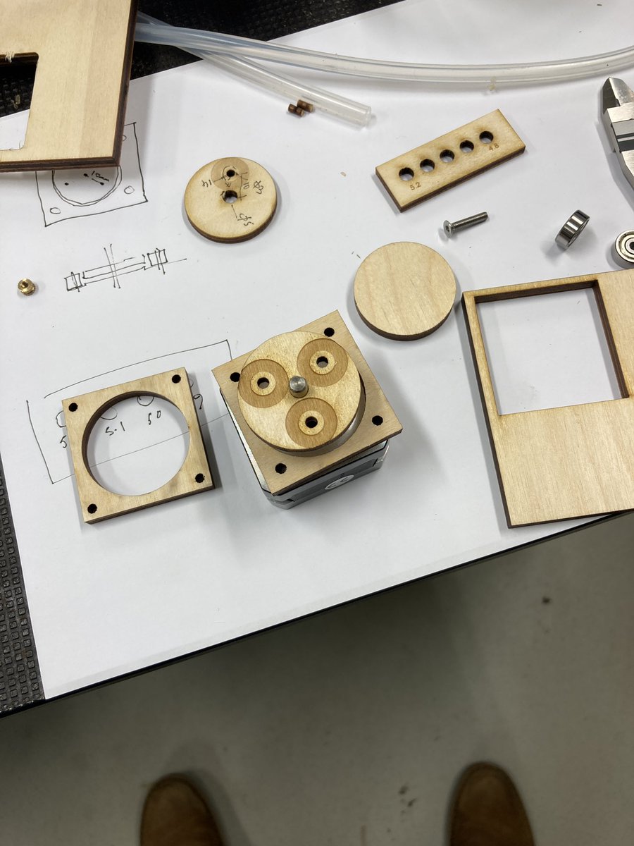 ehler's tweet photo. Laser training with some students, no key fobs today, prototype parts for a peristaltic pump #agricademy #agritech https://t.co/Hia8EoznXl