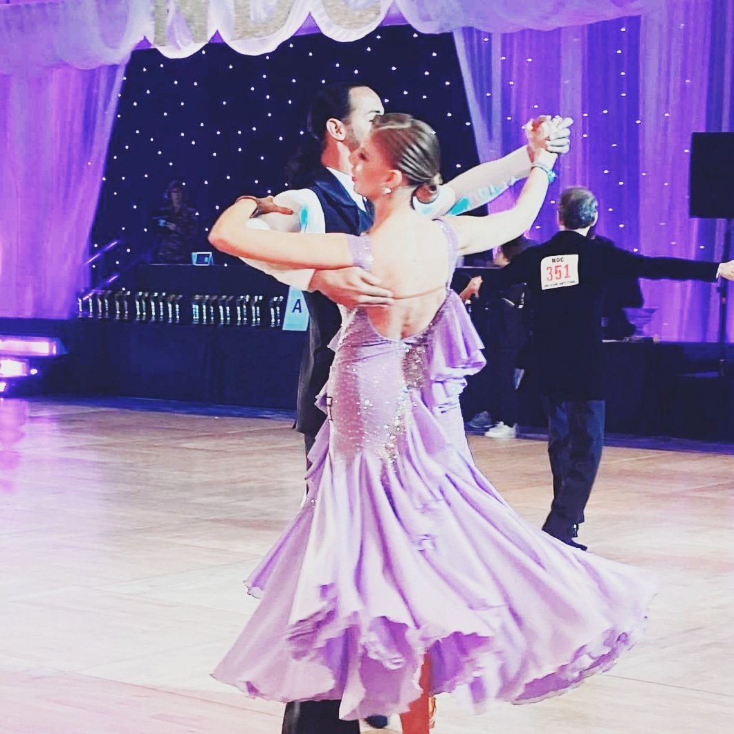 Final day of #NDC2021 saw Amy gliding across the dance floor in her smooth heats, a vision in purple! #lifesbetterwhenyoudance #fadsstrong #Dancer #Dance #ballroomdance #beauty #purple #smooth