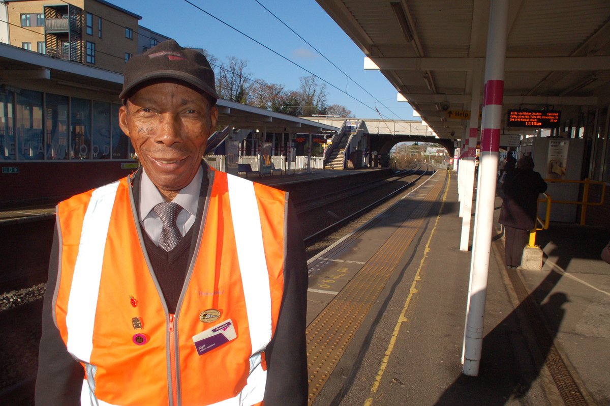 Siggy Cragwell standing on the platform at the station in his Hi-vis safety uniform.