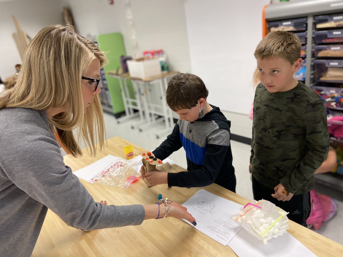 SchlieReed's tweet photo. @ElmwoodSDNB 2nd graders working with @kelliarado build prototypes for their consumer based on their #sketch and materials list @SDNBSchools #SDNBLearns #makerspace https://t.co/YMtnMjDbLC