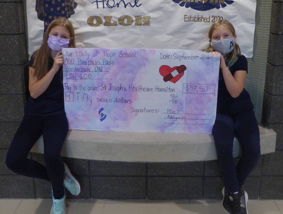 StJoesHamilton's tweet photo. We’re grateful to Mia & Adelynn, students @HWCDSB’s Our Lady of Hope Elementary, for their gift to St. Joe’s! To thank healthcare workers for their efforts during COVID-19, the pint-sized philanthropists crafted & sold bracelets to make a #BigCheque presentation to our Hospital! https://t.co/vEwHOQF7dU