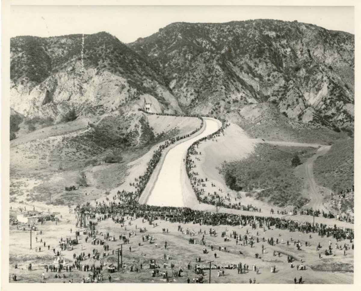 LAhistory's tweet photo. Nov 5, 1913: The Los Angeles Aqueduct opened #OTD. At the dedication, #WilliamMulholland uttered his famous line, "There it is -- take it." Photos from @UCLALibrary's #LAAqueduct Digital Platform: https://t.co/y5l7FR1PSt #ThereItIsTakeIt #envhist https://t.co/ZG6EB0SaVs