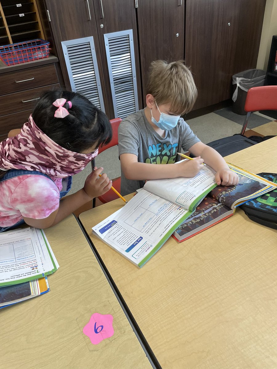 3rd graders collaborating on their close reading companion. Great conversations about how the author shows that two characters are different. Going back to the text to find text evidence helps these students find what the author did to help the reader. 💚🐾