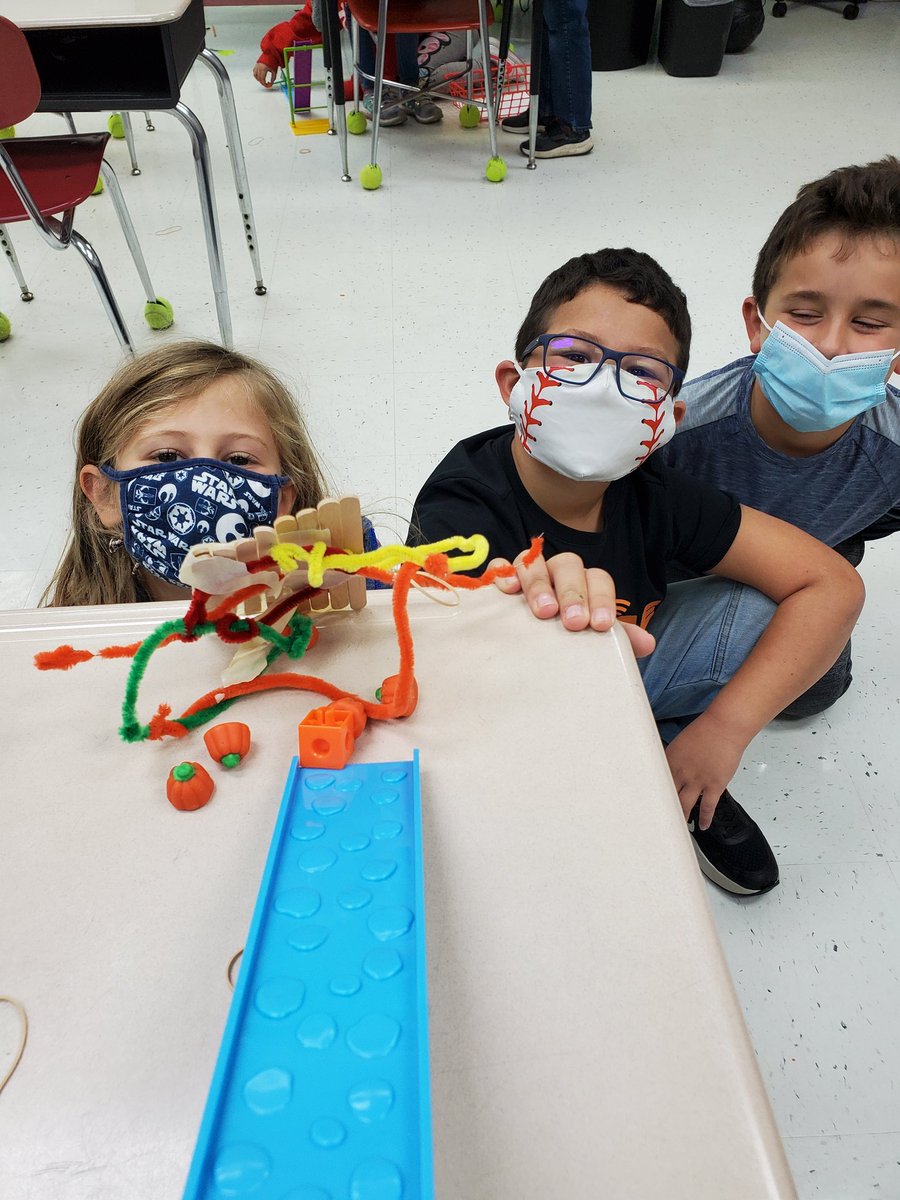 herschelsusan's tweet photo. We built strong fences to protect Spookley and his pumpkin friends in case another storm hits the pumpkin patch. We used ramps to roll (and slide) Spookley and his friends into the fence to test it. #stemandliteracy @hescubcats @JTWord111 https://t.co/foZCMjPtib