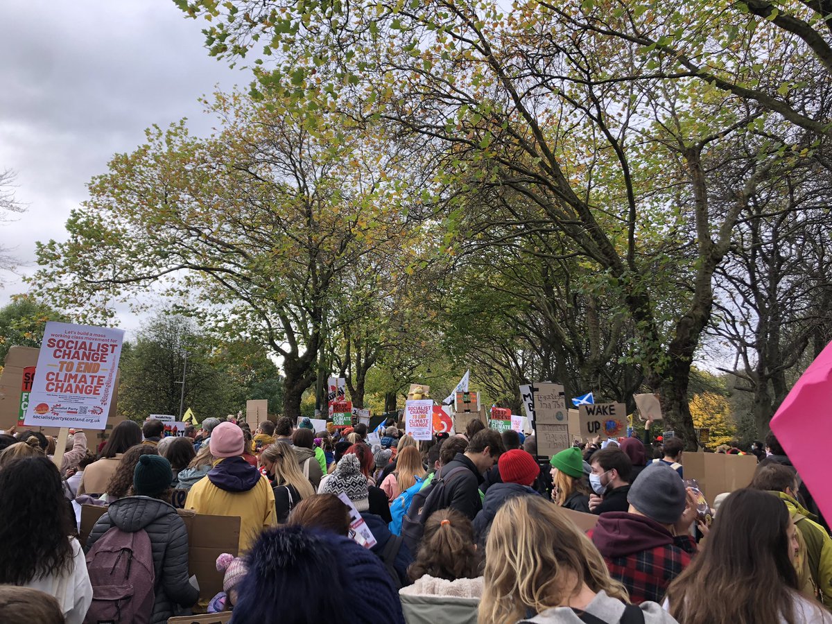 MargaretFaust5's tweet photo. The #climatestike at #kelvingrove park is packed with people marching. Chants, signs, and drums. #COP26 https://t.co/iUiNXC5Bms