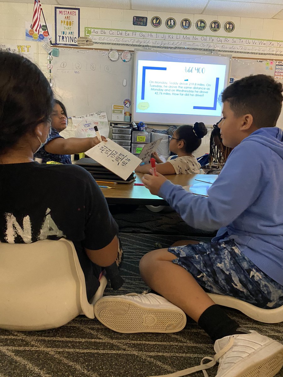 BeverlyAtsma's tweet photo. JEOPARDY math review = TEAMWORK @oges_fifth @OGESeagles #ccsdsteam @CherokeeSchools https://t.co/piLozGgdCx