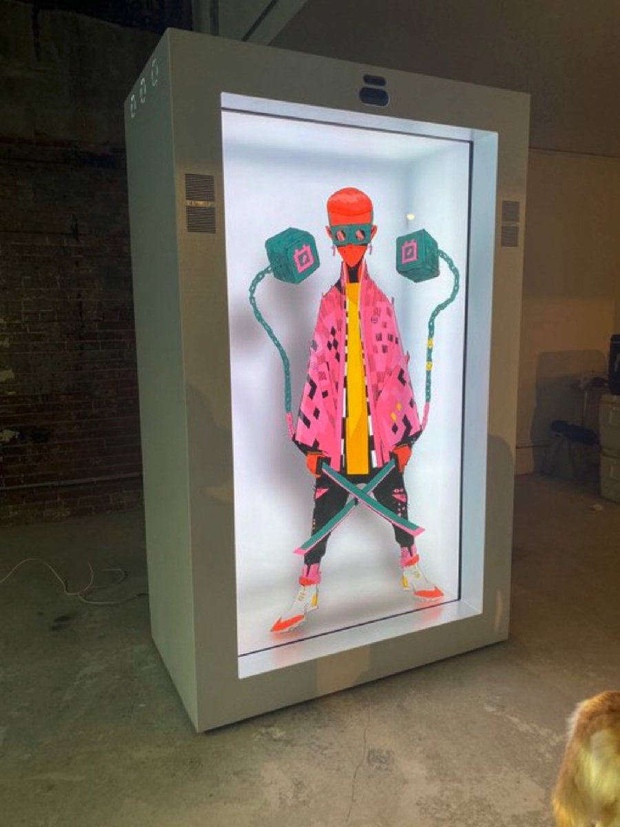 cromagnus's tweet photo. For the record i dropped a hologram at NFTNYC. No one shared it so I guess I’ll just pimp myself here with the one crappy pic i have because i did not make it to nftnyc. If you have video of this LMK. Artists!!! never rely on others to document your work!!! On chain https://t.co/l9HV3vpYID