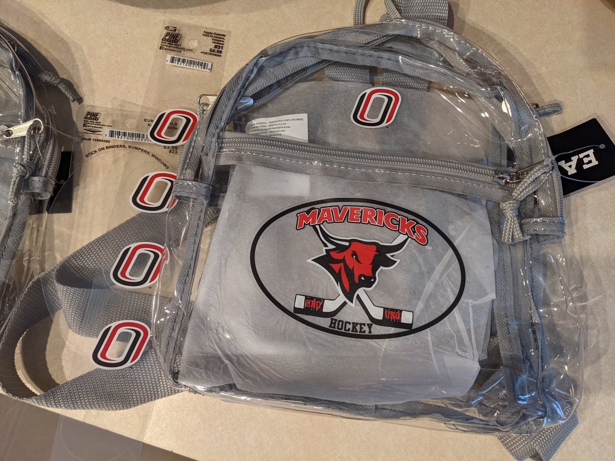 abbydawn's tweet photo. Getting arena bags ready for @OmahaHKY tonight. The @uno_bookstore hooked me up with a cute clear backpack and Mavs decals!! https://t.co/l9N4yIpTIN