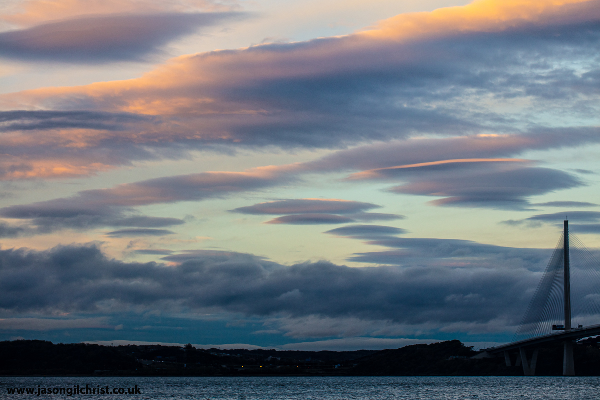 jgilchrist13's tweet photo. Flying saucer clouds (lenticular clouds) gathering o'er Rosyth, Fife, fae South Queensferry, Edinburgh, Scotland, sundown this evening. #LenticularClouds #clouds #Rosyth #Fife #QueensferryCrossing #Edinburgh #Scotland #OutdoorPhotography #StormHour #ThePhotoHour #WeatherWatchers https://t.co/HxDmlcePnM