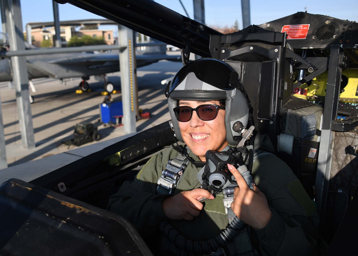 144thFW's tweet photo. U.S. Air Force Tech. Sgt. Cynthia Gomez, a member of the 144th Medical Group, prepares for an incentive flight with U.S. Air Force Maj. Kirk Adams, 144th Operations Group pilot, Nov. 5, 2021, at the Fresno Air National Guard Base, Calif. #aviation #15CEagle #fighterjet #join144 https://t.co/bMYInTHnUY