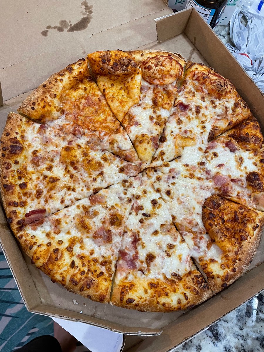 CraigMeddin's tweet photo. @dominos this is ridiculous. One burnt and one 40% no cheese or toppings. No dinner for me, and not enough for all the kids that were here :( No resolution by email or app. Can you help? https://t.co/3UuLccWOfE
