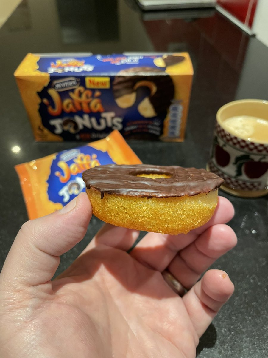 macintosh's tweet photo. I mean it's nice. But it's not a donut. More like a orange filled chocolate topped twinky. #jonuts https://t.co/CfZEeGLhdi