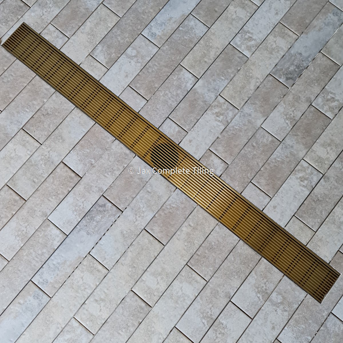 jaxtiling's tweet photo. Brass Strip Drain for Bathrooms https://t.co/m3bI73VE4F
