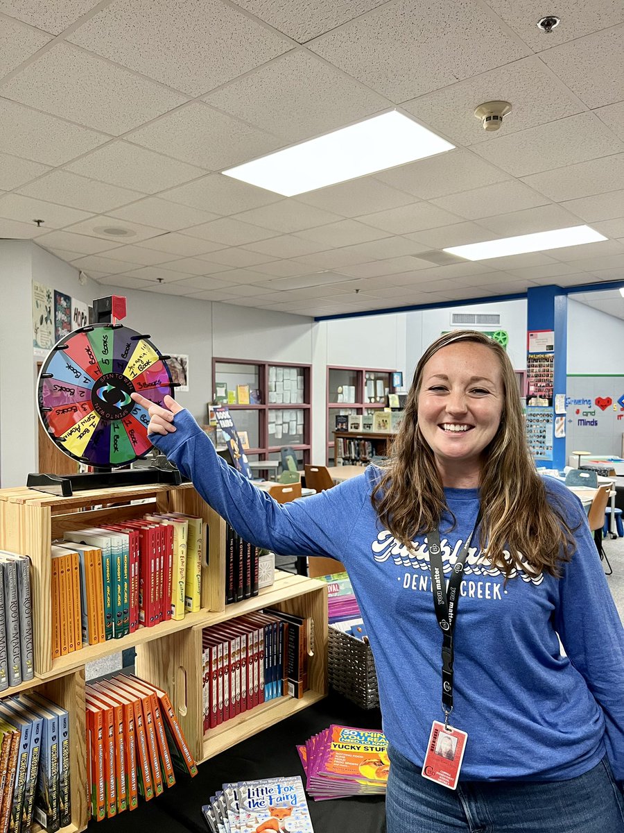 Mrs_McDonaldDCE's tweet photo. Her first spin said “1 book and spin again” her second spin landed on 5 books!! Yay @MissCarlton4th 🥳  Thank you to Kate Hawkins and CISD #funfriday @DCEtrailblazers https://t.co/4z9QA1Q9ml