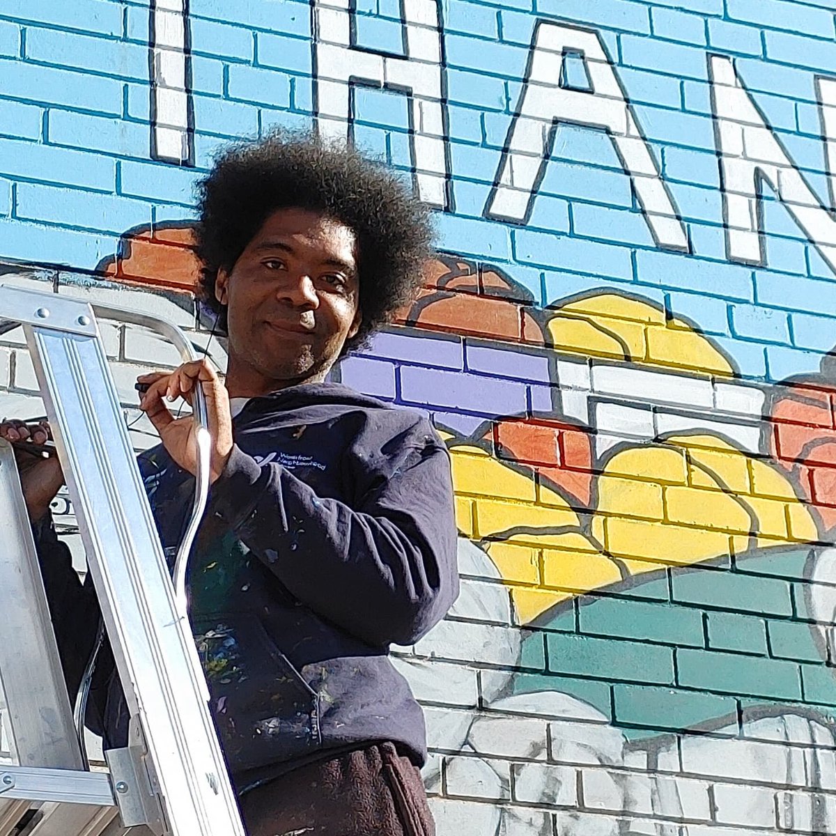 lauraknew's tweet photo. Today was a beautiful day to be painting a mural! Artist Jim Bravo said that "today is faces day". I love the faces of our #LakeshoreVillage frontline workers. #thankyoufrontliners #supportlocalart #shoplocal @alternasavings https://t.co/ZrfdOlQ1YW