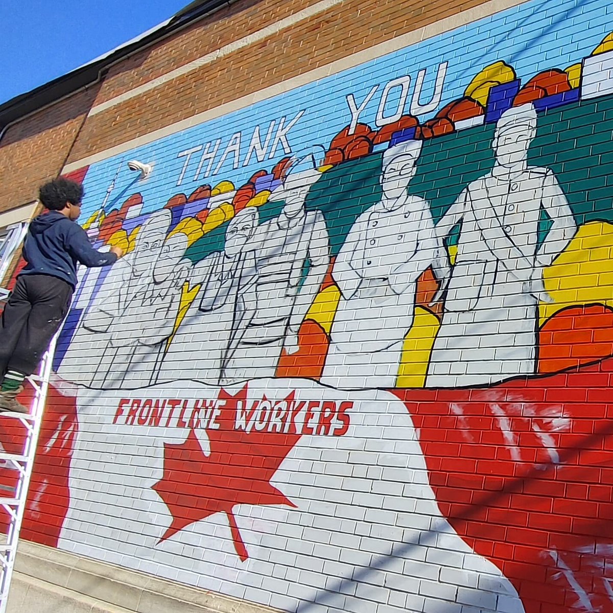 lauraknew's tweet photo. Today was a beautiful day to be painting a mural! Artist Jim Bravo said that "today is faces day". I love the faces of our #LakeshoreVillage frontline workers. #thankyoufrontliners #supportlocalart #shoplocal @alternasavings https://t.co/ZrfdOlQ1YW