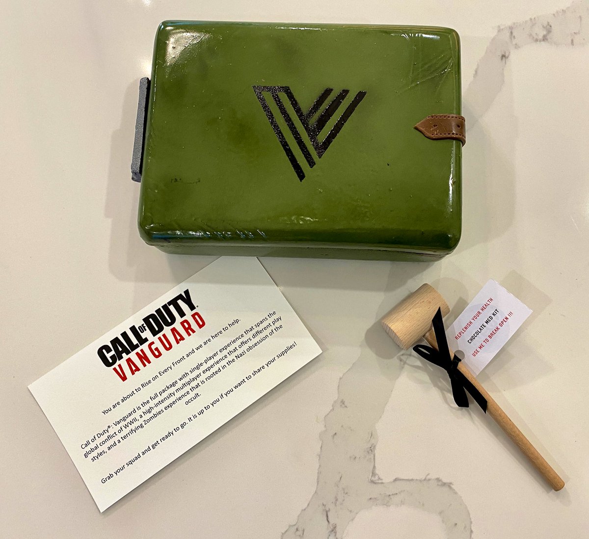 Dapper_Tux's tweet photo. The med kit has to be smashed to access more goodies, but it’s so cool looking, I just can’t do it! 😬

I still can’t believe this entire thing is chocolate 🍫 beautiful! 

Dapper Jr. on the other hand is ready to drop the hammer 🔨 

#CallofDuty #Vanguard https://t.co/GCUcgF1o9K