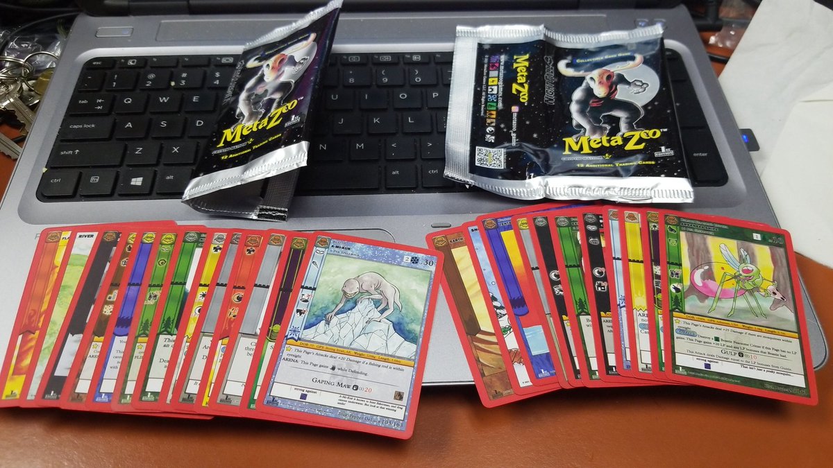 joahPrivette's tweet photo. 1 pack was missing a gold and had 11 cards, but the next pack had an extra gold and 13 cards... #metazoo https://t.co/jQwZONFkgT