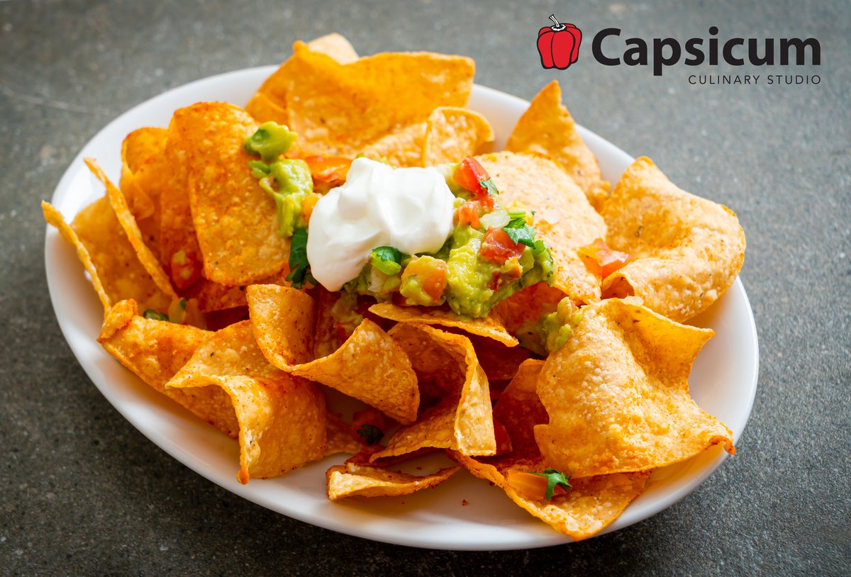 capsicumcooking's tweet photo. Today we celebrate #NationalNachoDay! There is no one specific way to make it as long as it has two main ingredients: Chips and as much cheese as you can pile on, and an abundance of flavour and toppings to add. What's your favourite topping?
#capsicumcooking #capsicumchef https://t.co/4g3kf34T34
