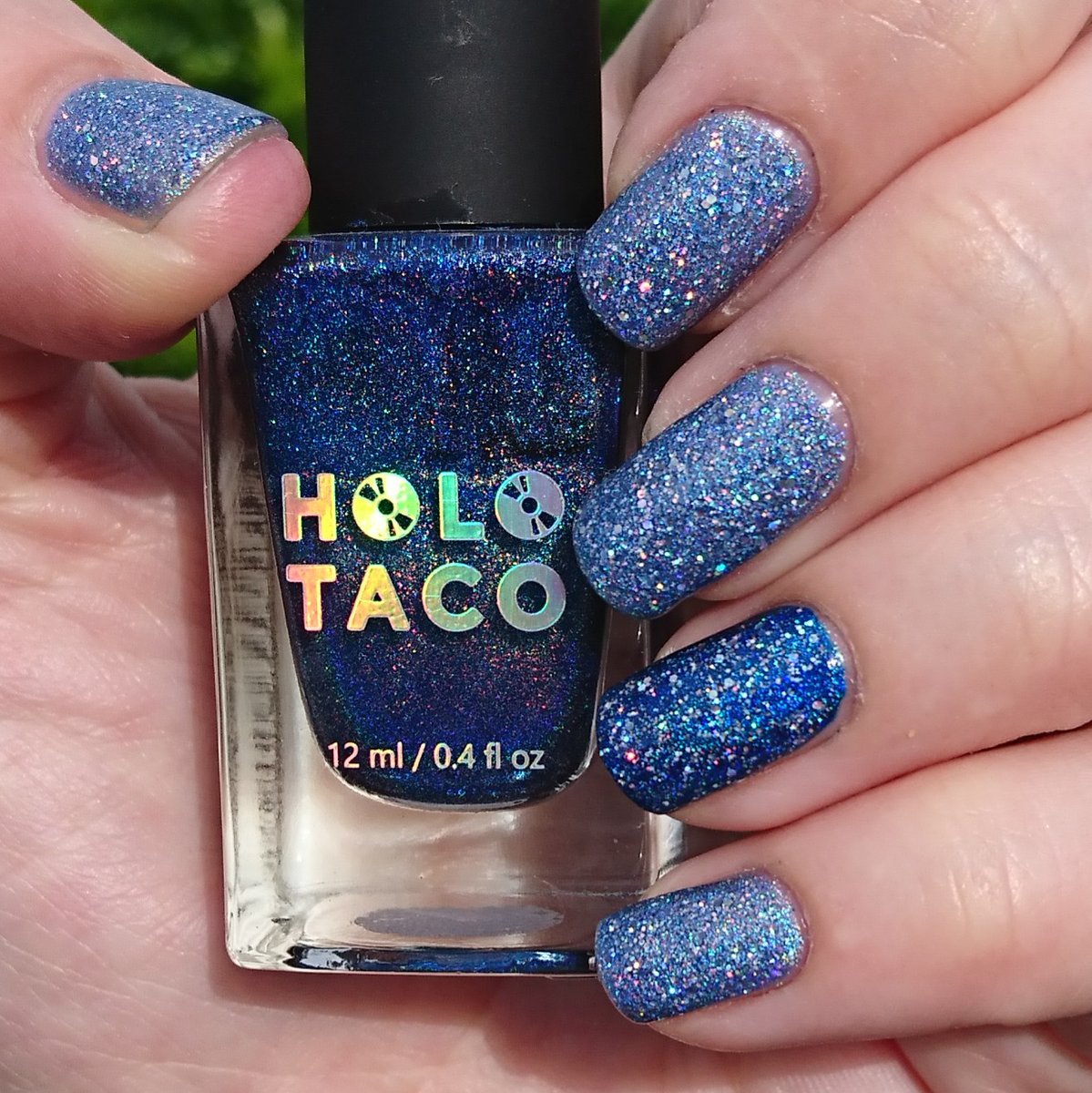 delicatelie89's tweet photo. Holo Taco combo recipe for success #1: two coats of #sparklingwater and #bluefreezie linear holo polish, plus one coat of #frostlight glitter holo polish 💿🌮✨💦❄💙 #holotacocombo #holotaco @holotaco @nailogical https://t.co/jn7LCDBFmi