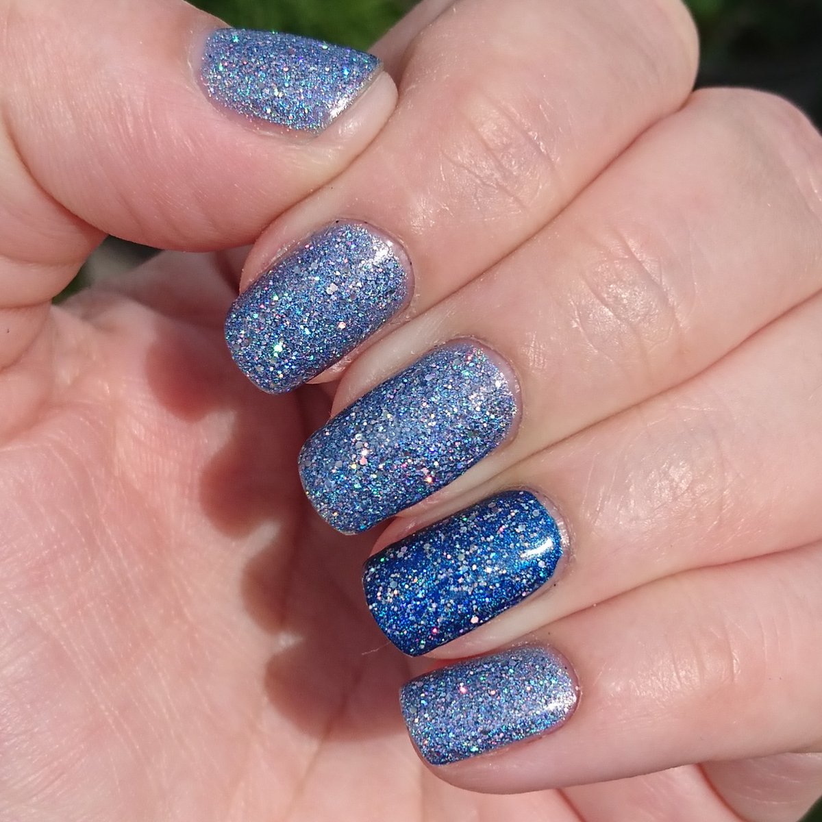 delicatelie89's tweet photo. Holo Taco combo recipe for success #1: two coats of #sparklingwater and #bluefreezie linear holo polish, plus one coat of #frostlight glitter holo polish 💿🌮✨💦❄💙 #holotacocombo #holotaco @holotaco @nailogical https://t.co/jn7LCDBFmi