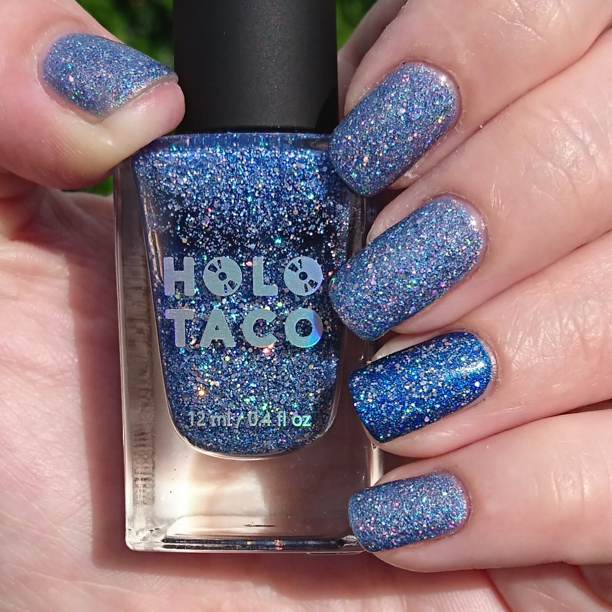 delicatelie89's tweet photo. Holo Taco combo recipe for success #1: two coats of #sparklingwater and #bluefreezie linear holo polish, plus one coat of #frostlight glitter holo polish 💿🌮✨💦❄💙 #holotacocombo #holotaco @holotaco @nailogical https://t.co/jn7LCDBFmi