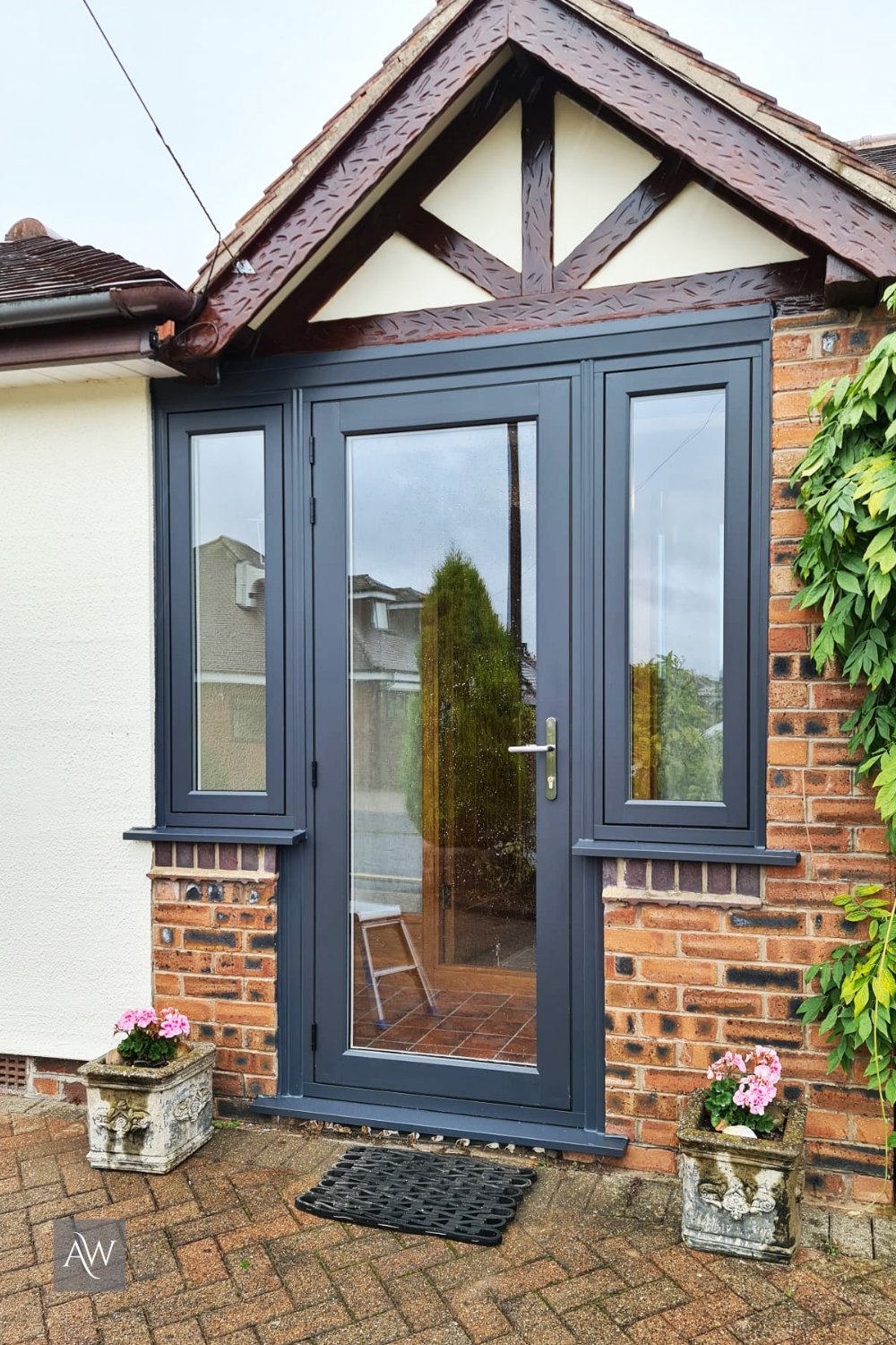 Alexander Windows on Twitter: "This lovely porch renovation is a considered  blend of traditional and modern. Pictured: The Residence Collection fully  glazed entrance door with R7 flush casement sidelights. R7 replicates  traditional