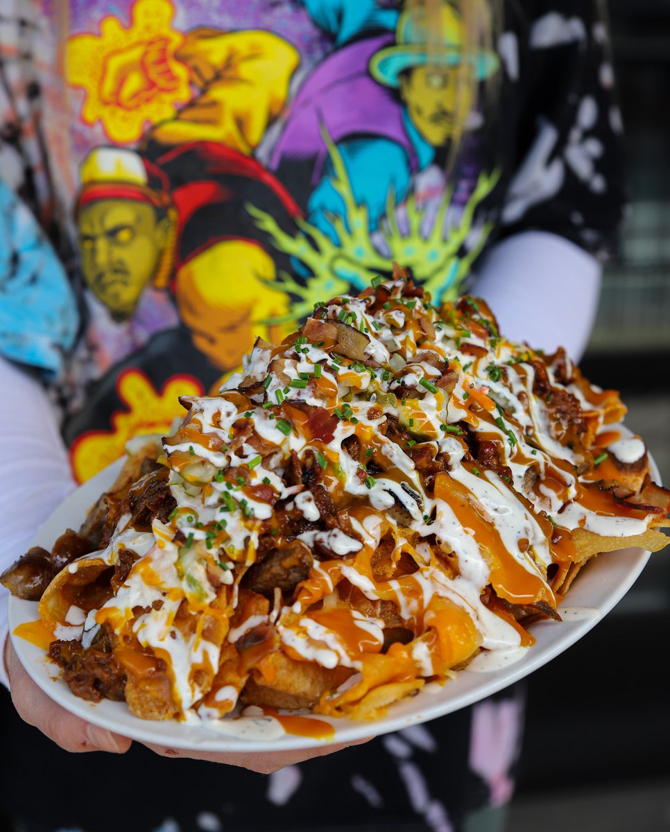 Did someone say it’s NACHOS DAY? We’re on board! Come join us for the best (chip) nachos ever - THE PIG PILE!!!