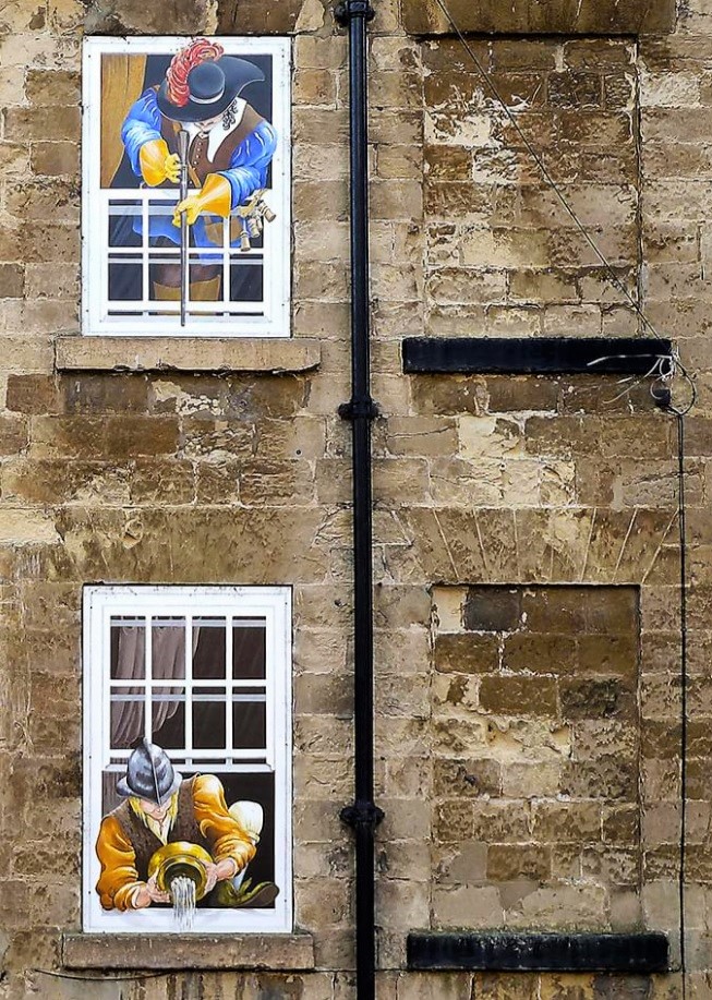 JSilloth's tweet photo. Some great tromp d'oeil windows in Knaresborough. The roundhead and cavalier is a classic as is the one at the station ticket office. #exploringbritain https://t.co/JaPT1aWEuC