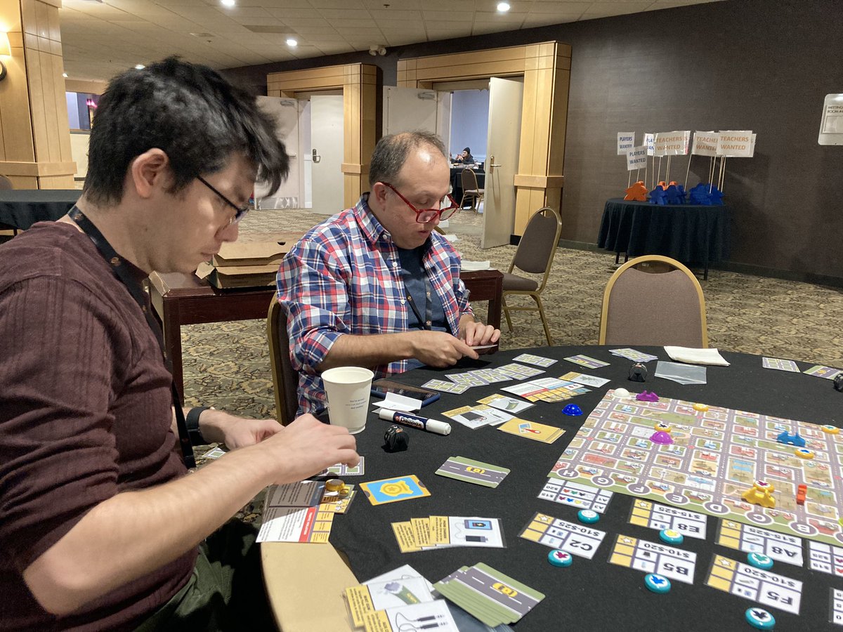 TokenGaymer's tweet photo. Always nice to get in-person playtests of Curbside! #taxigame #pickupdeliver #programableaction #routebuilding #games #gaymer #tabletopgames #gamedesigner #tabletopgamedesign #playtesting #cusecon https://t.co/83FHELhHQs