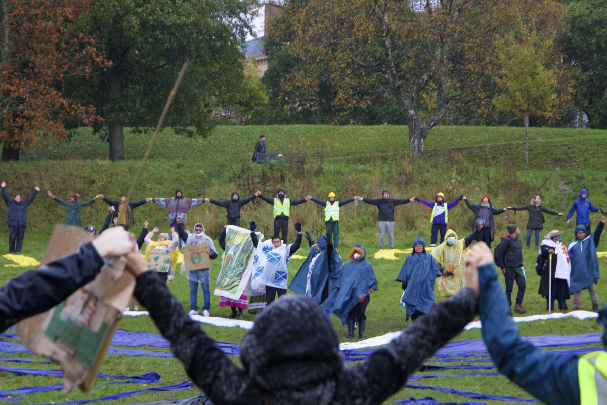 Oikoumene's tweet photo. People of faith joined hands and walked together with thousands of participants of the #COP26 march in Glasgow today. We have an obligation to care for each other + for our common home, the Earth for which we were entrusted to be caretakers. @ecocongregation @Greenanglicans #WCC https://t.co/Hsm8xHYnBq