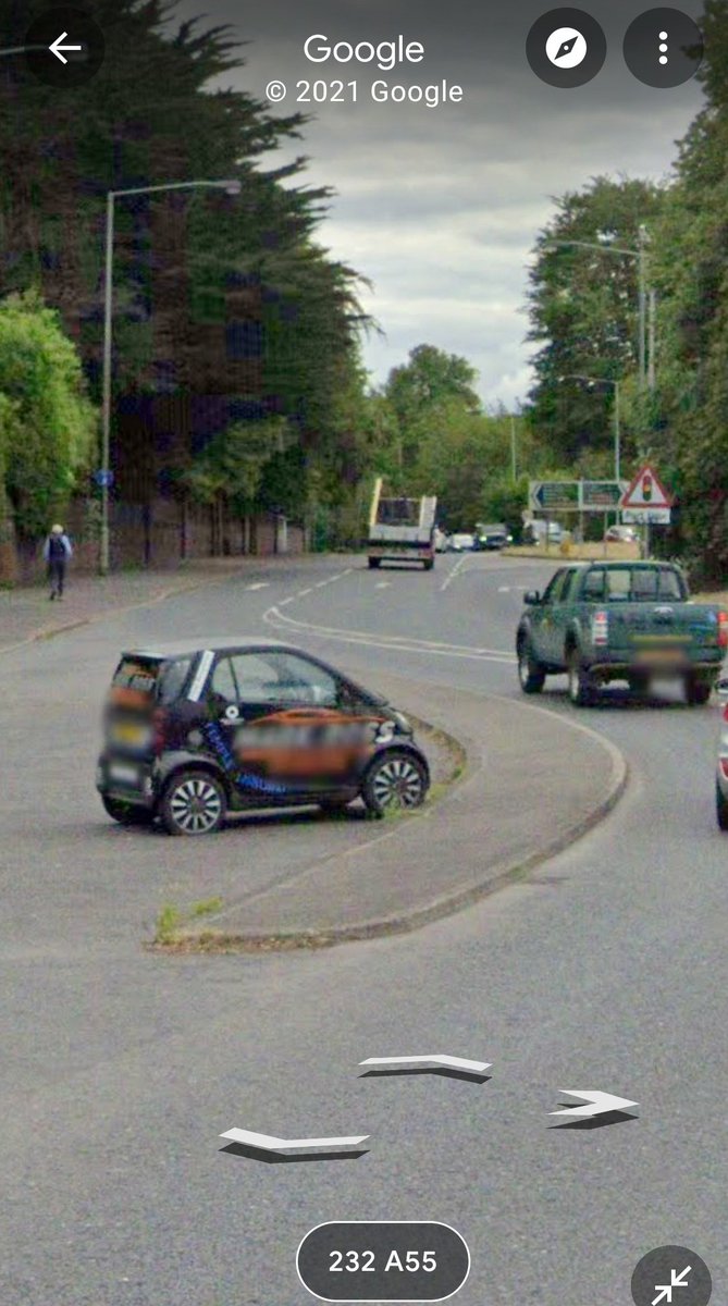 Malone_Road's tweet photo. Its been there so long that it is on Google maps. Absolute joke that its parked there for 18 months, absolute joke it has not been moved and absolute joke that some can flaunt advertising hoardings to just rack up and "dump" a car. Anyone know the car dealership or history? https://t.co/kD04qErEtL