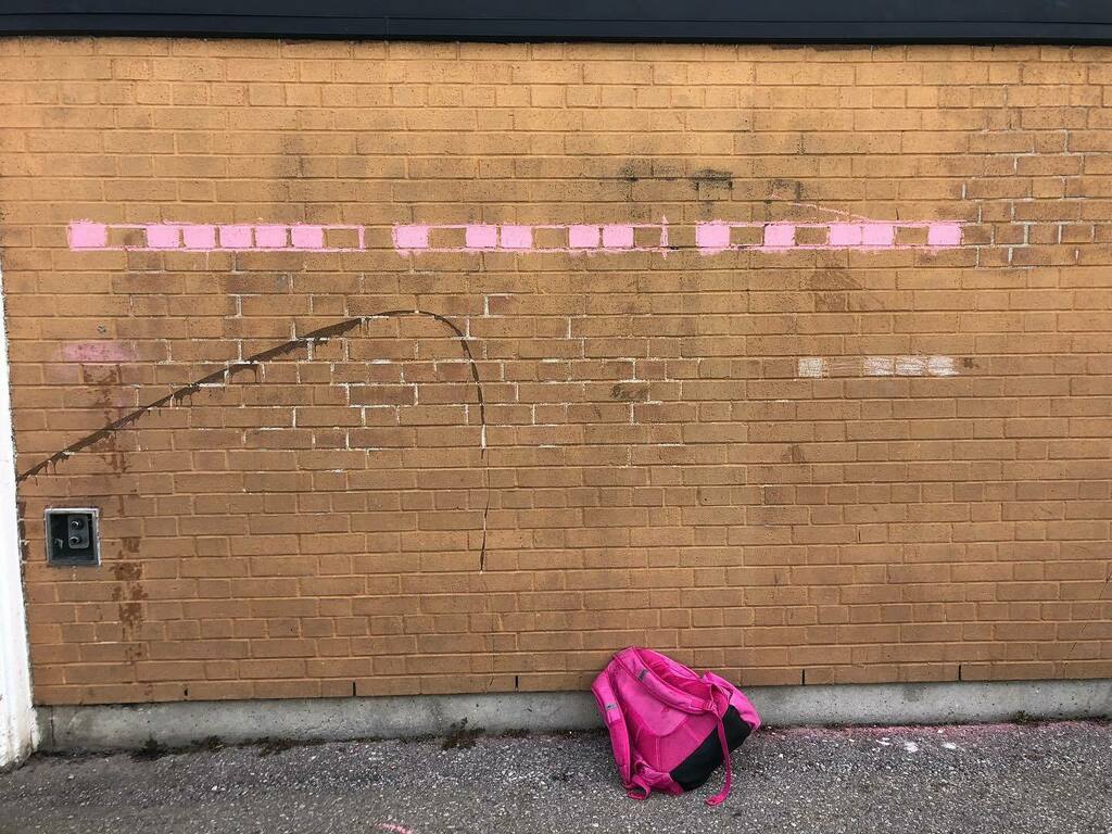 TeacherHann's tweet photo. Adventures in #outdoored #tdsbstem @donviewms #tdsb this week. Doing some #csed #csunplugged Binary Coding on the walls with sidewalk chalk. Can you read what these girls wrote? 😉🤩 #makeredto https://t.co/FuWxcXydmr https://t.co/umaEwOxxSJ