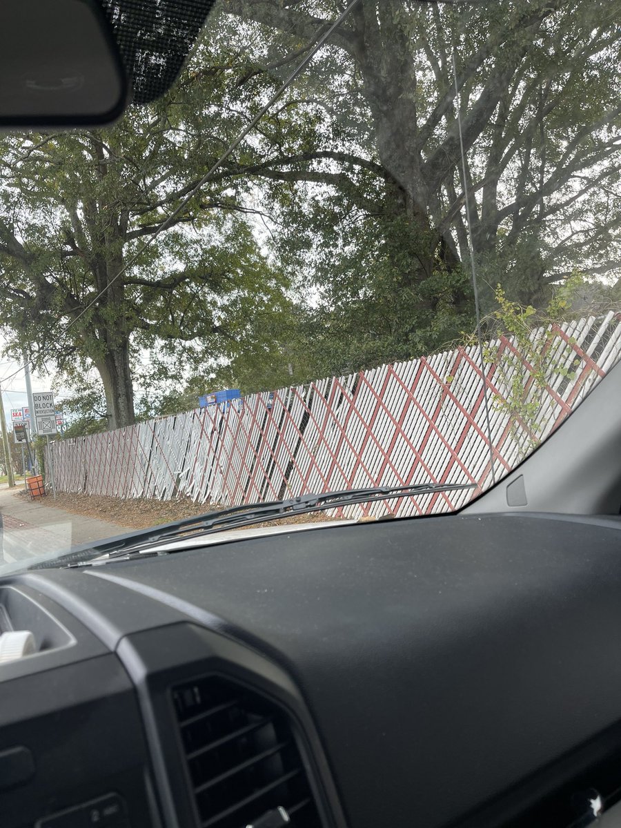 EyeZick's tweet photo. ATLiens. This fence is legendary. IFKYK. #CandlerRd https://t.co/mAEZYiKTyu