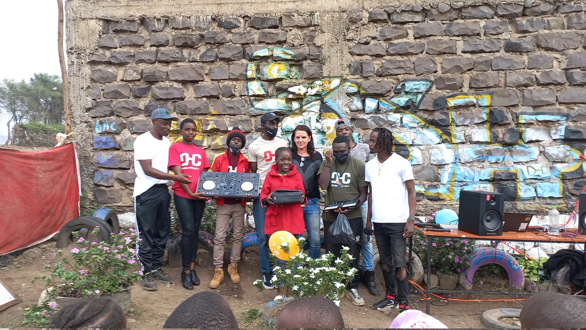 JulianiKenya's tweet photo. I went to @DandoraHHC for my monthly retouch. Turns out there was more; Voice4Change has been with us since 2019. Helped set up the studio.Leo they got us a Dj set for our weekly events &amp; Dj trainings. 

We also launched the DHC collective album &amp; officially opened the backyard. https://t.co/SmqLJ99lEo