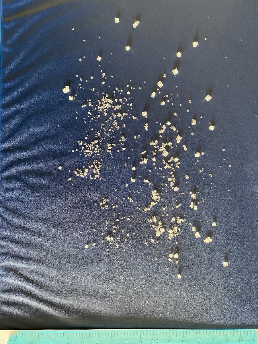 We had a cold a couple months ago. We were trying to reduce the pain of the throat with a salt-water mixture. We forgot it in a cup and after some time the water evaporated; this was the leftover. :))