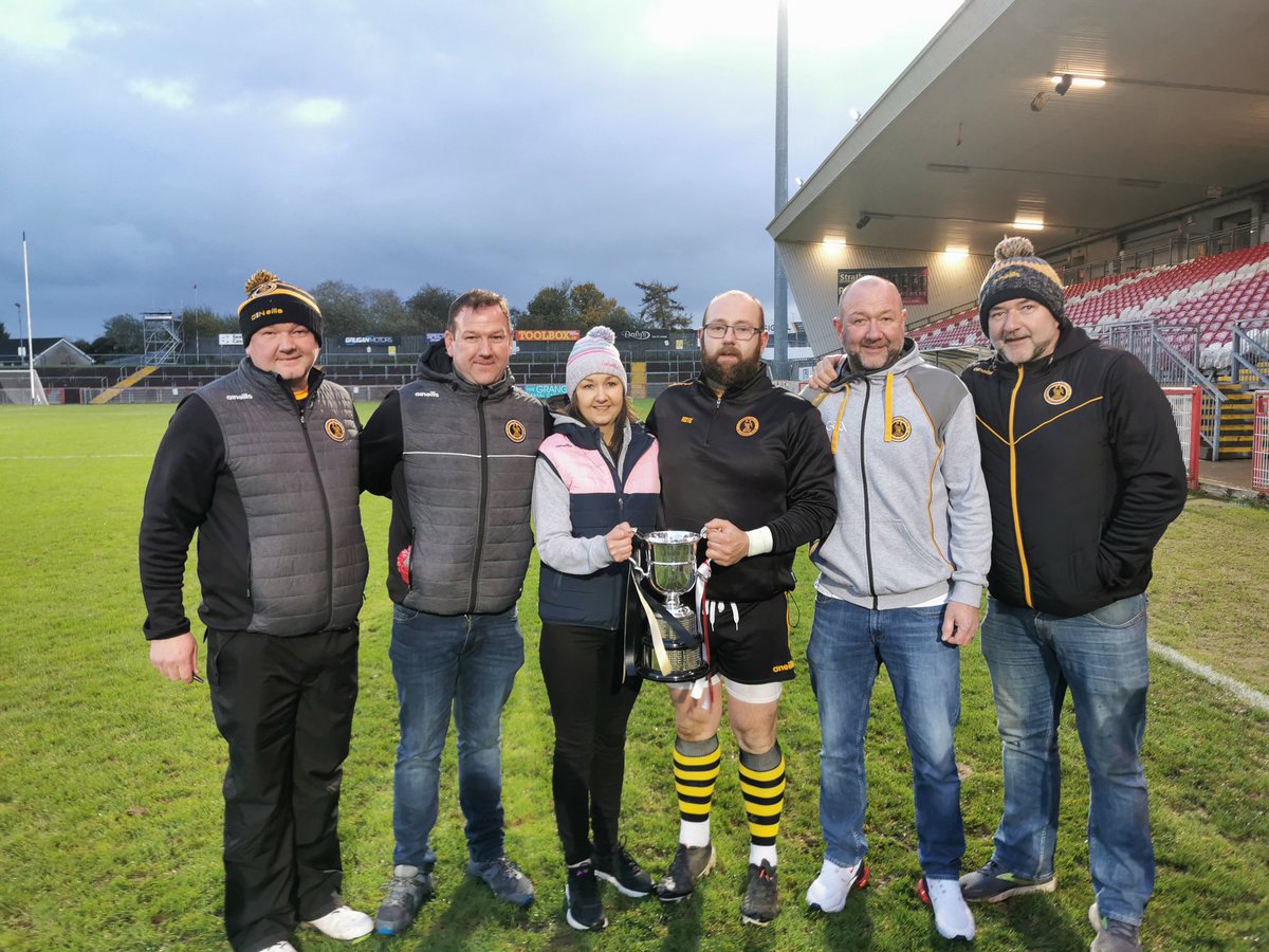 Conor McElhatton the victorious Eire Ogs captain joins with his brothers and his sister L-r Ciaran, Plunkett, Mairead, Sean &amp; Pearse celebrating the 27th Tyrone Senior Championship title. Jimmy their Dad R. I. P looking down proudly.