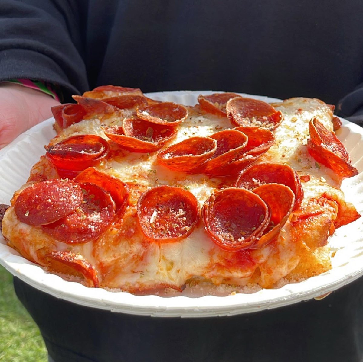 firstwefeast's tweet photo. Grandma square with pepperoni from @littlecoyotelbc 😋in the @complexcon Lagoon! #ComplexCon2021 https://t.co/h4IQIwQh7l
