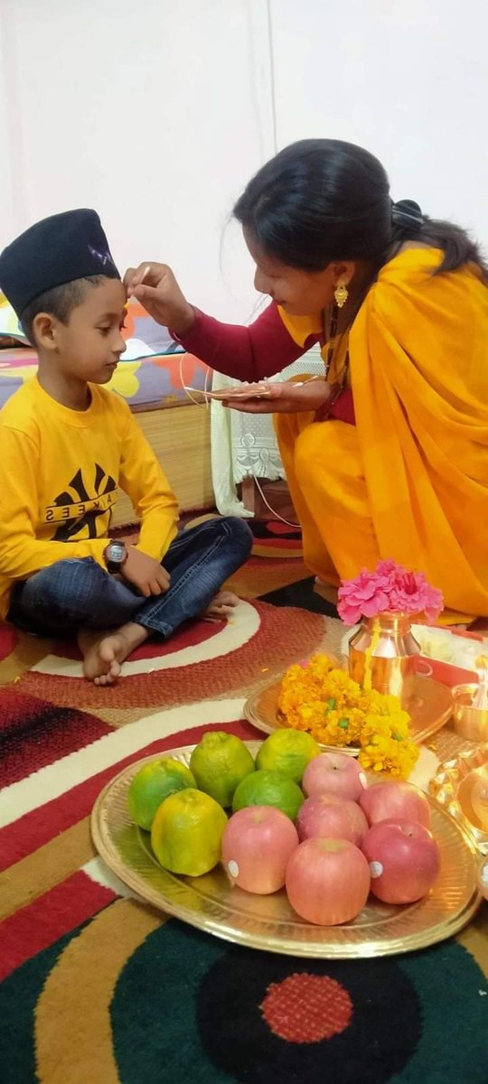 my reflection( son) मेरो अनुपस्थितिमा मेरो बहिनी बाट भाइटीका लागाउदै☺️