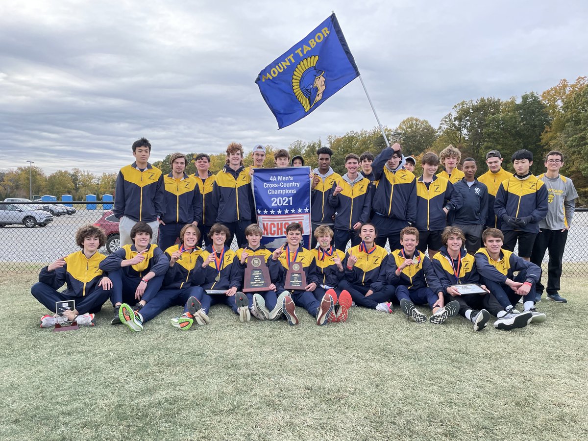 Coach_Crom's tweet photo. Here they are… Your 2021 4A Cross Country State Champions.  This is for all of us ⁦@Tabor_City⁩ 🏆 
#LongGoldLine #AsOne #Ring#5 https://t.co/Y3he9t9kQq