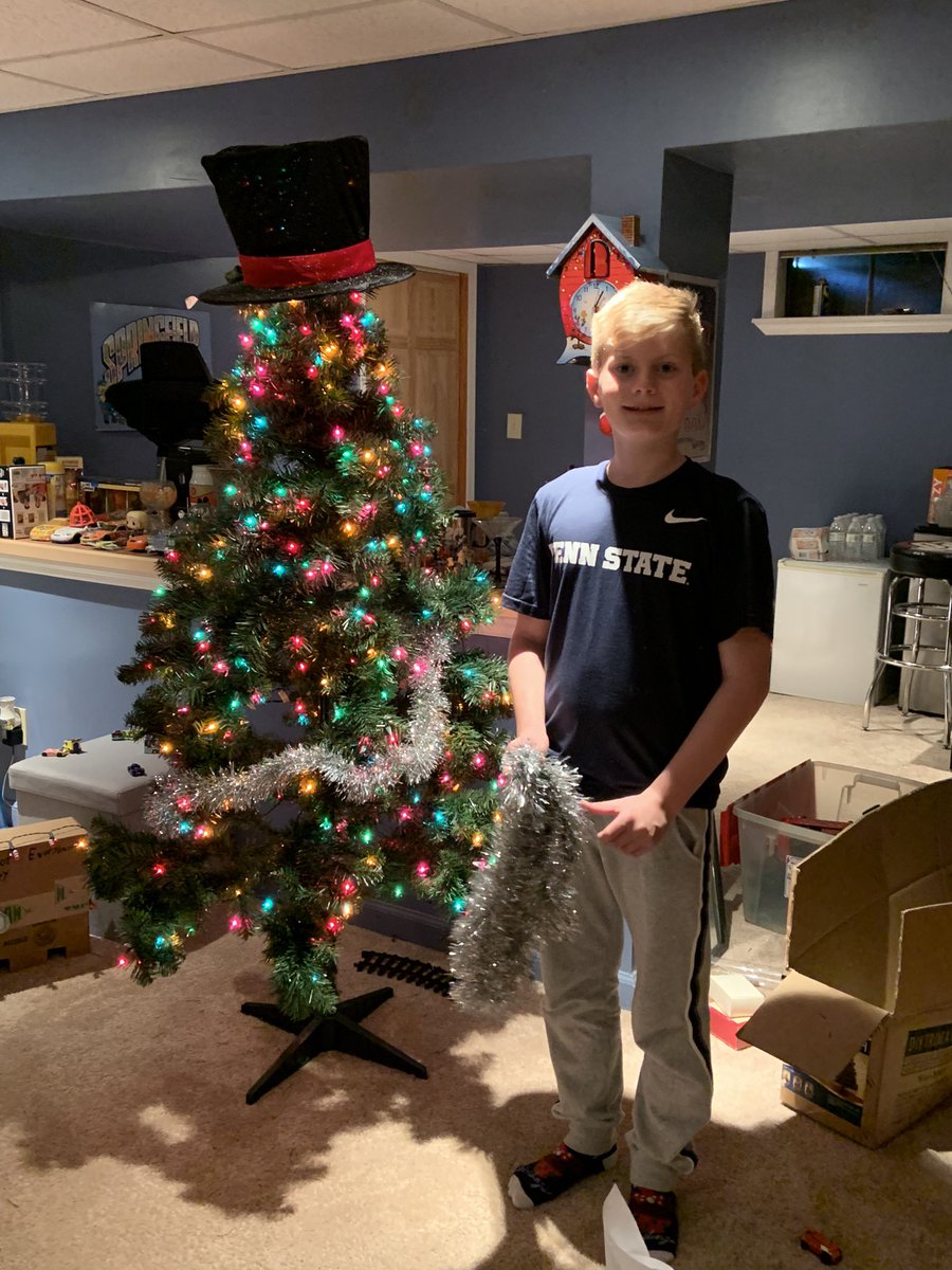 alock5051's tweet photo. @BigcheeseColby decorating his Christmas tree. I think it’s too early. https://t.co/u9BQv65P7K