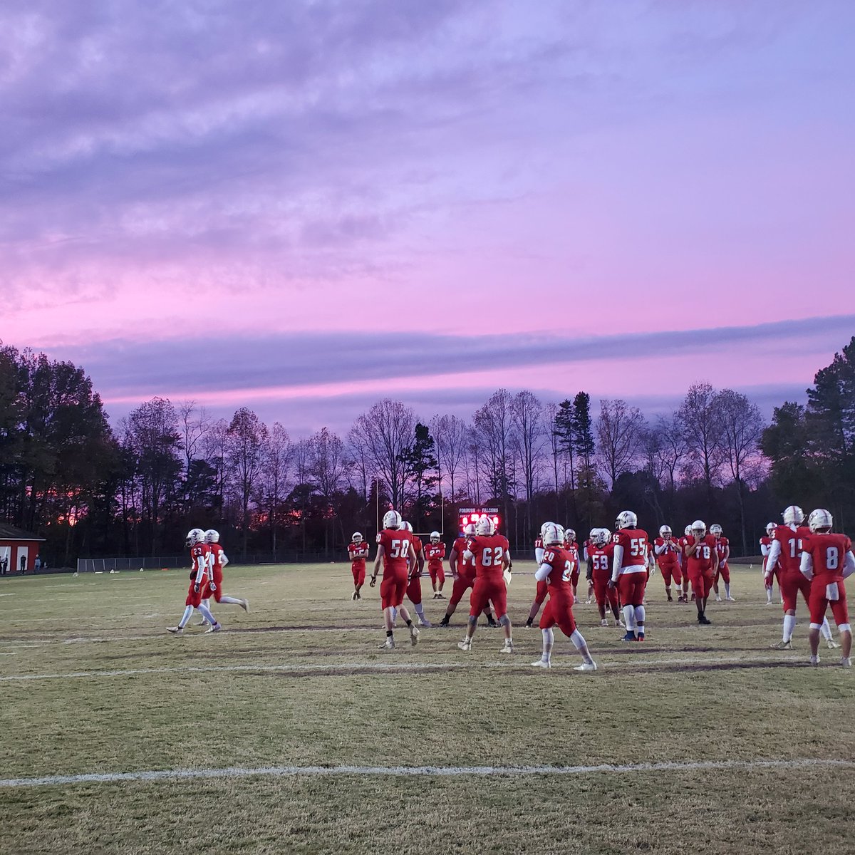 A night full of emotion at Forbush High School tonight. 💜Purple skies 💜purple on our field and 💜purple in our heavy hearts. A true FAMILY win for our team and our community.
