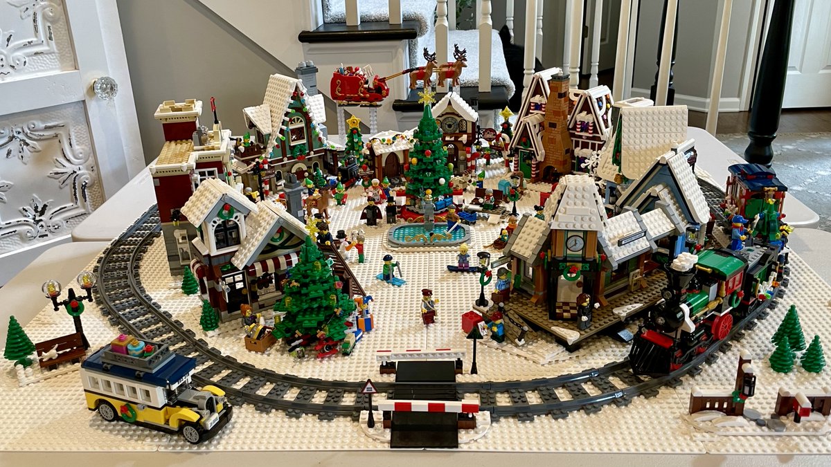 mclear's tweet photo. We added this year's #LEGO creator expert set and Santa's sleigh to our collection. I absolutely love how our winter village turned out. Now, if you need me, this will be my happy place for the rest of the year. #Christmas https://t.co/8M8ljADItr