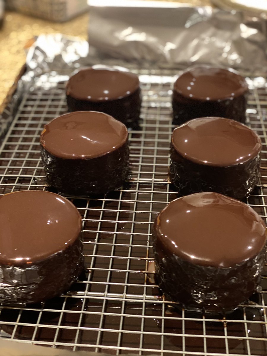 the_money_pit's tweet photo. Raspberry chocolate mousse cakes with a chocolate mirror glaze. https://t.co/O0ZeppmQJR