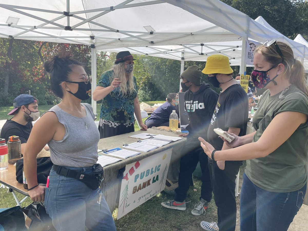 publicbankla's tweet photo. We're out here tabling at the @SunriseMvmtLA block party, connecting with the community on the benefits of a public bank that will leverage its deposit base &amp; lending power to benefit LA residents with affordable housing, sustainability initiatives &amp; critical community needs.🌱 https://t.co/ljYYkAPrPE