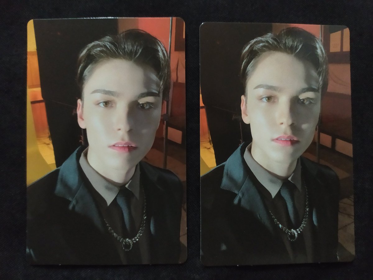 hoshihaebaragi's tweet photo. oh my god.....so i was about to sell these pc i thought these were the same but when i check the backside both has different numbers.......vernon why😭 https://t.co/OwPvJrSClo