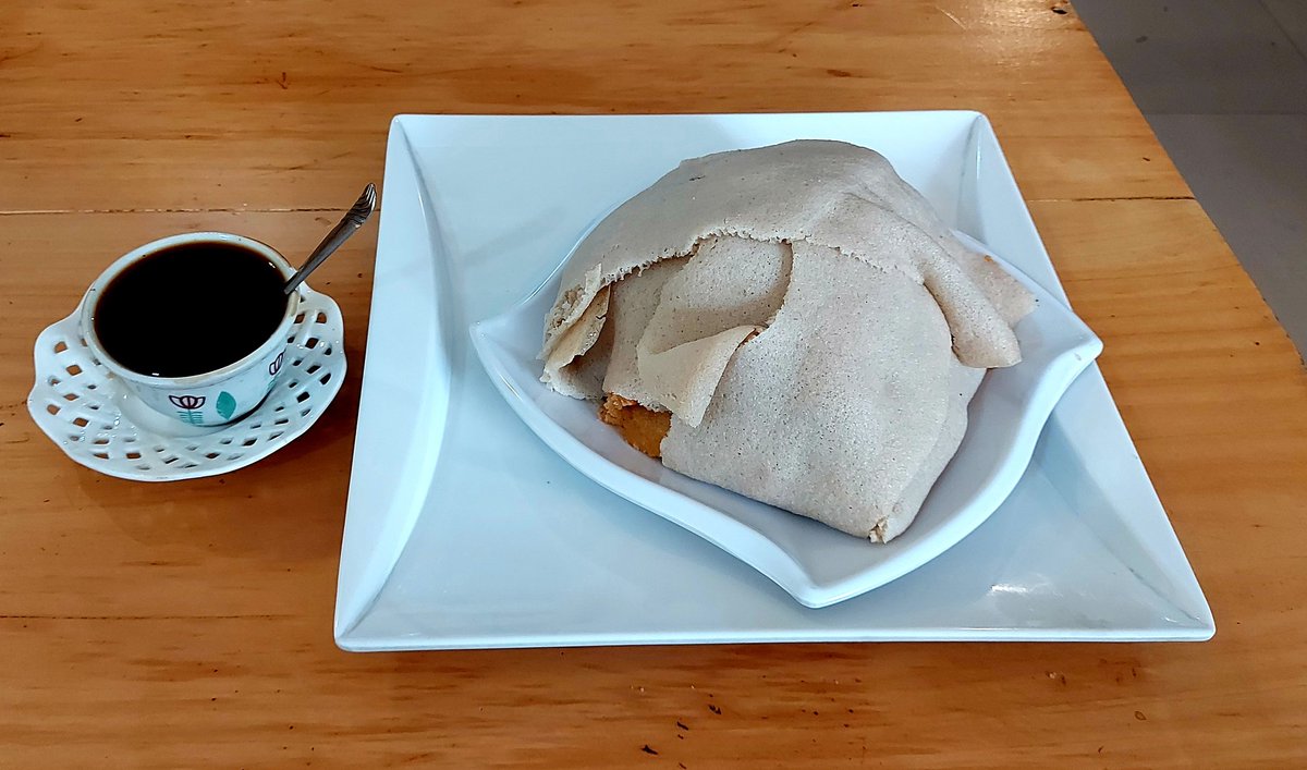 Wagobera's tweet photo. Kahawa + Injera = Complete Ethiopian breakfast 🇪🇹 🥣 😋
#Ethiopia https://t.co/1JXxZ354Gl
