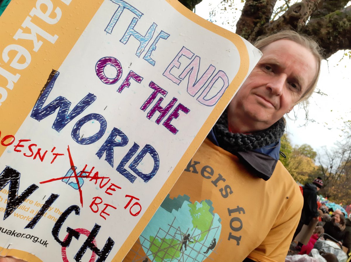 RCquaker's tweet photo. I'm home again (and dried out), but still rejoicing at all the people who came out to march for climate justice yesterday. Look out for more from #QuakersAtCop this week! https://t.co/RDeGMlfXYX