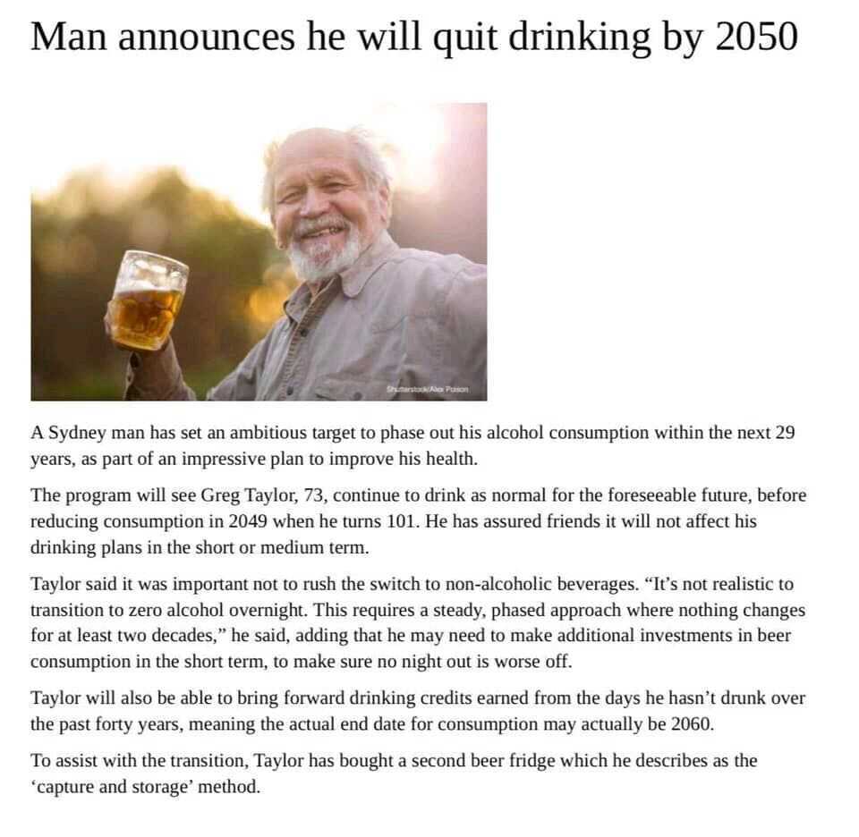 Man annouces he will quit drinking by 2050 - Picture of a man holding a beer. 